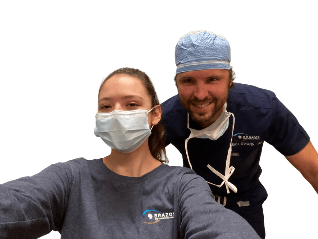 Selfie of Dr. Beau Swann with a LASIK patient wearing a surgical mask and cap