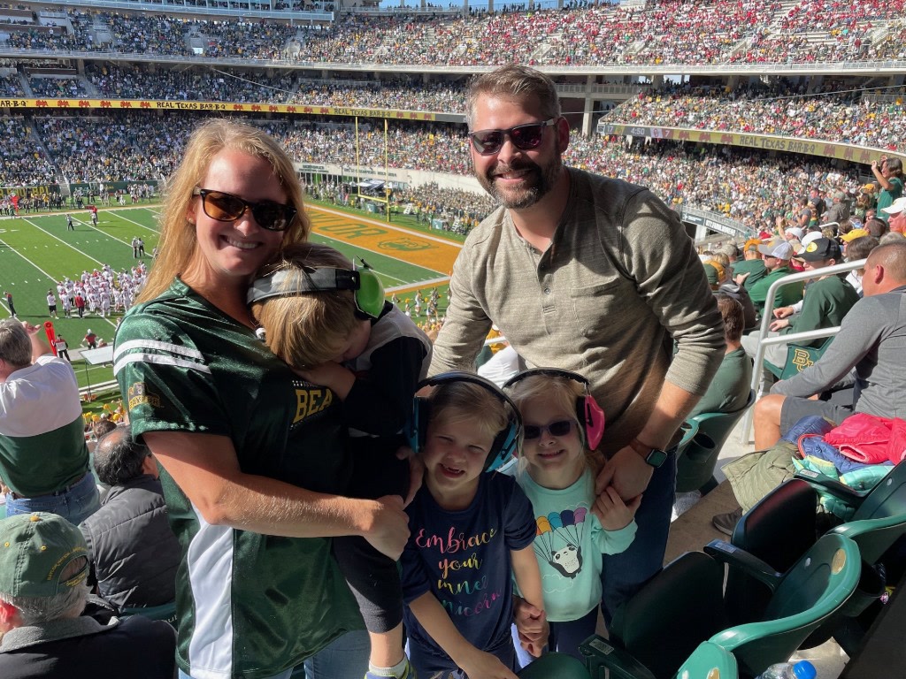Brad and Jordan Swann with their children at a Baylor football game in Waco