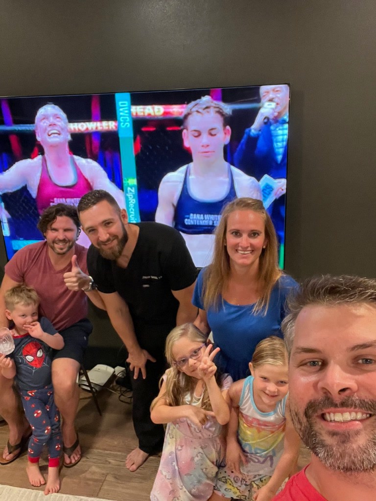 Dr. Beau Swann and Dr. Jordan Tanous with family — clinical partnership and trust